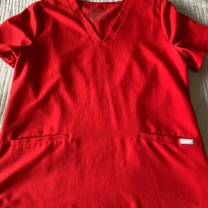 3 figs tops, 1 figs pant, 1 koi pant.  All size med